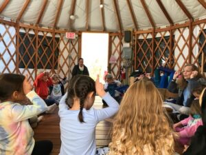 Children inside the yurt at Thistlewaithe