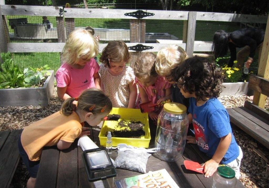 Children using the water table at Thistlewaithe's South Salem campus